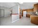 Kitchen with wood cabinets, white appliances, and tile floor at 17113 Se 78Th Larchmont Ct, The Villages, FL 32162