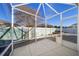 Cozy screened patio with access to the backyard at 17113 Se 78Th Larchmont Ct, The Villages, FL 32162