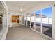 Screened porch with kitchen view and access to backyard at 17113 Se 78Th Larchmont Ct, The Villages, FL 32162