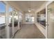 Bright screened porch with sliding glass doors and tile floor at 17113 Se 78Th Larchmont Ct, The Villages, FL 32162