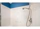 Clean shower with white tile and handheld showerhead at 17113 Se 78Th Larchmont Ct, The Villages, FL 32162