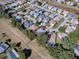 Aerial view of a single-story house in a quiet neighborhood at 17242 Se 94Th Coults Cir, The Villages, FL 32162