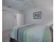 Bright bedroom with double doors and carpet flooring at 17242 Se 94Th Coults Cir, The Villages, FL 32162