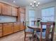 Cozy dining area with round table and four chairs at 17242 Se 94Th Coults Cir, The Villages, FL 32162