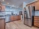 Bright kitchen featuring stainless steel appliances, granite countertops, and lots of cabinet space at 17242 Se 94Th Coults Cir, The Villages, FL 32162