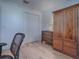 Home office with wood furniture and ample closet space at 17242 Se 94Th Coults Cir, The Villages, FL 32162