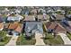 Single-Gathering home with a two-car garage and nicely landscaped yard in a residential neighborhood at 1757 Landrum Ln, The Villages, FL 32162