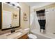 Bathroom with tub shower combo and granite vanity at 1757 Landrum Ln, The Villages, FL 32162