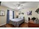 Small bedroom with wood floors and built-in desk at 1757 Landrum Ln, The Villages, FL 32162