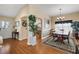 Bright dining room with hardwood floors and a wooden table at 1757 Landrum Ln, The Villages, FL 32162