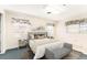 Bright bedroom featuring carpet and neutral walls, complemented by stylish decor and lots of natural light at 1801 Vine St, Leesburg, FL 34748