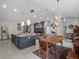 Open concept dining area adjacent to the kitchen at 2012 Flaming Arrow Ct, Fern Park, FL 32730