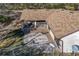 Home with large backyard patio and screened enclosure at 26650 Pelican St, Eustis, FL 32736
