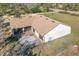 Home featuring a large backyard patio and screened enclosure at 26650 Pelican St, Eustis, FL 32736