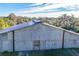 Aerial view of a large metal barn on a rural property at 26650 Pelican St, Eustis, FL 32736