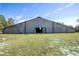 Large barn with double doors and open space at 26650 Pelican St, Eustis, FL 32736