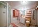 Small bathroom with shower, toilet and sink at 26650 Pelican St, Eustis, FL 32736