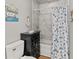 Bathroom with shower/tub combo and nautical theme at 26650 Pelican St, Eustis, FL 32736