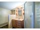 Small bathroom with shower, vanity, and toilet at 26650 Pelican St, Eustis, FL 32736