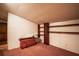 Small bedroom with wood furniture and shelves at 26650 Pelican St, Eustis, FL 32736