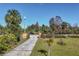 Driveway with gate and landscaping at 26650 Pelican St, Eustis, FL 32736