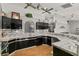 Modern kitchen with stainless steel appliances and granite countertops at 26650 Pelican St, Eustis, FL 32736