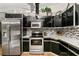 Updated kitchen with stainless steel appliances and granite countertops at 26650 Pelican St, Eustis, FL 32736