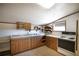 Small kitchen with wood cabinets and appliances at 26650 Pelican St, Eustis, FL 32736
