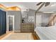 Main bedroom with ensuite bathroom access and plenty of dresser storage at 26650 Pelican St, Eustis, FL 32736