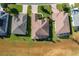 Aerial view of three homes with backyard lanais at 27103 Camerons Run, Leesburg, FL 34748
