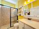 Bright bathroom with shower and updated vanity at 27103 Camerons Run, Leesburg, FL 34748