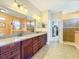 Large bathroom with double vanity and walk-in shower at 27103 Camerons Run, Leesburg, FL 34748