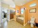 Bathroom with garden tub, shower, and toilet at 27103 Camerons Run, Leesburg, FL 34748