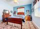 Charming bedroom featuring antique wooden furniture at 27103 Camerons Run, Leesburg, FL 34748