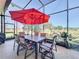 Outdoor patio area with table and chairs at 27103 Camerons Run, Leesburg, FL 34748