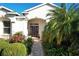 Well-maintained front yard with a brick walkway at 27103 Camerons Run, Leesburg, FL 34748