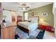 Main bedroom with ensuite bathroom, neutral decor, and ample closet space at 27103 Camerons Run, Leesburg, FL 34748