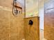 Modern shower with tile surround and built-in shelving at 27103 Camerons Run, Leesburg, FL 34748