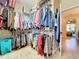 Spacious walk-in closet, well-organized with hanging rods at 27103 Camerons Run, Leesburg, FL 34748