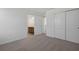 Bedroom featuring carpeted floors and a bathroom at 2833 Supermarine Rd, Tavares, FL 32778
