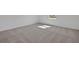 Bright bedroom features neutral carpet and a window at 2833 Supermarine Rd, Tavares, FL 32778