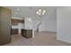 Spacious open floorplan kitchen area with an island and stainless appliances at 2833 Supermarine Rd, Tavares, FL 32778