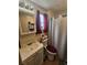 Bathroom featuring a sink, vanity, toilet and shower at 30 Riverview Dr, Fruitland Park, FL 34731