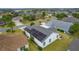 Aerial view of home featuring solar panels at 3707 Gravel Ct, The Villages, FL 32163