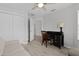 Bedroom with desk, closet, and ceiling fan at 3707 Gravel Ct, The Villages, FL 32163