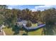 House with fenced backyard, palm tree, and large lot at 422 W 11Th Ave, Mount Dora, FL 32757