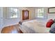 Spacious bedroom with wood flooring and large windows at 422 W 11Th Ave, Mount Dora, FL 32757