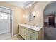 Bathroom view featuring vanity with double sinks, and walk-in shower at 5640 Se 21St Ln, Ocala, FL 34480