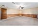 Spacious bedroom featuring neutral color palette, ceiling fan and ample natural light at 5640 Se 21St Ln, Ocala, FL 34480