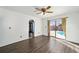 Bright living room with sliding glass doors that offer view of the pool at 5640 Se 21St Ln, Ocala, FL 34480